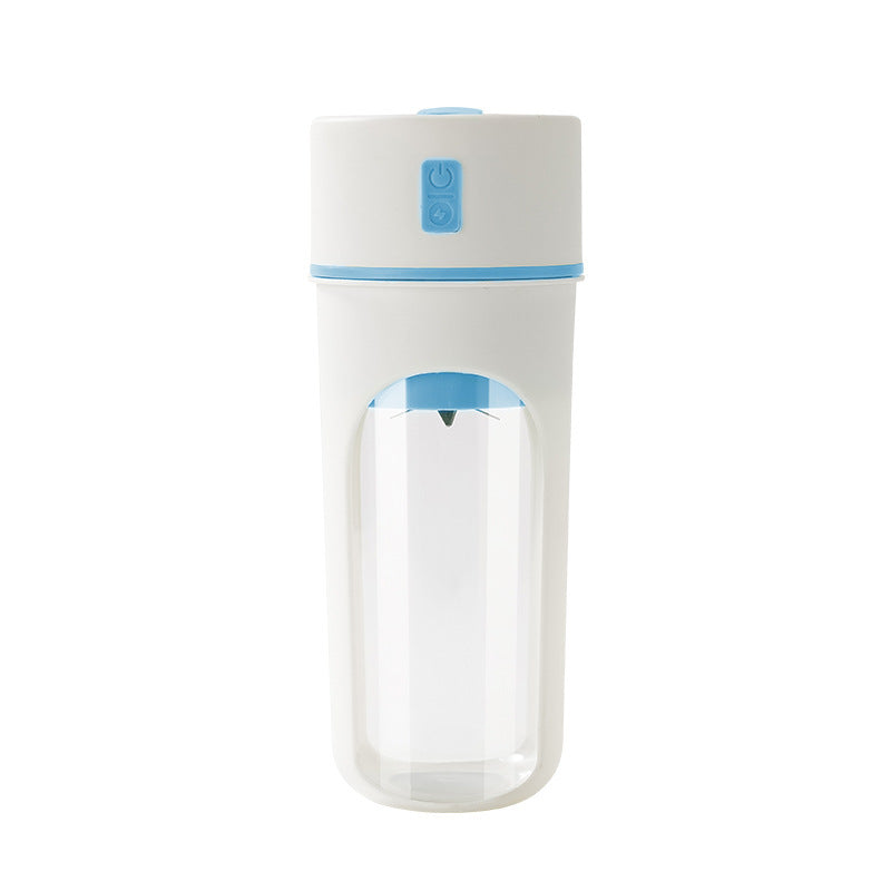 Clear electric juicer with blue accents on a white background
