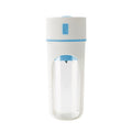 Clear electric juicer with blue accents on a white background