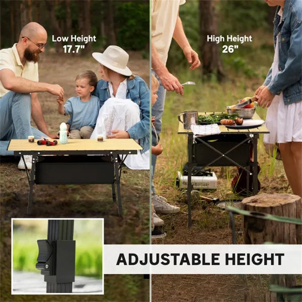 Camping table at low height for sitting on the ground and at high height for cooking
