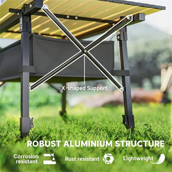 Close-up of the aluminum legs and X-shaped support of the folding camping table