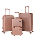 Rose gold 4-piece hard shell luggage set with vanity case and three spinner suitcases on a white background